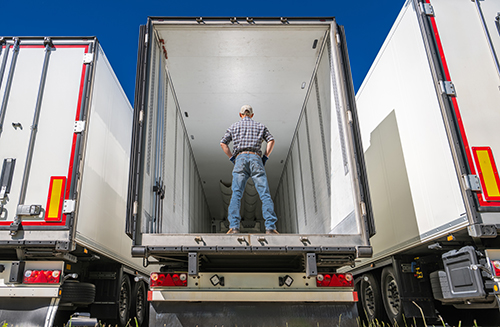 colored truck trailers loading